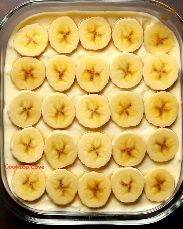 Chef layers banana slices over Cool Whip, ends up with the most decadent dessert of all